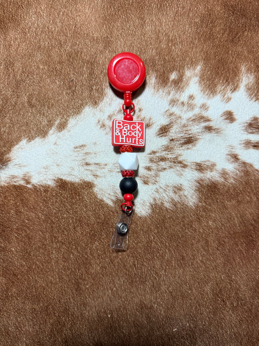 Back and Body Hurts Badge Reel