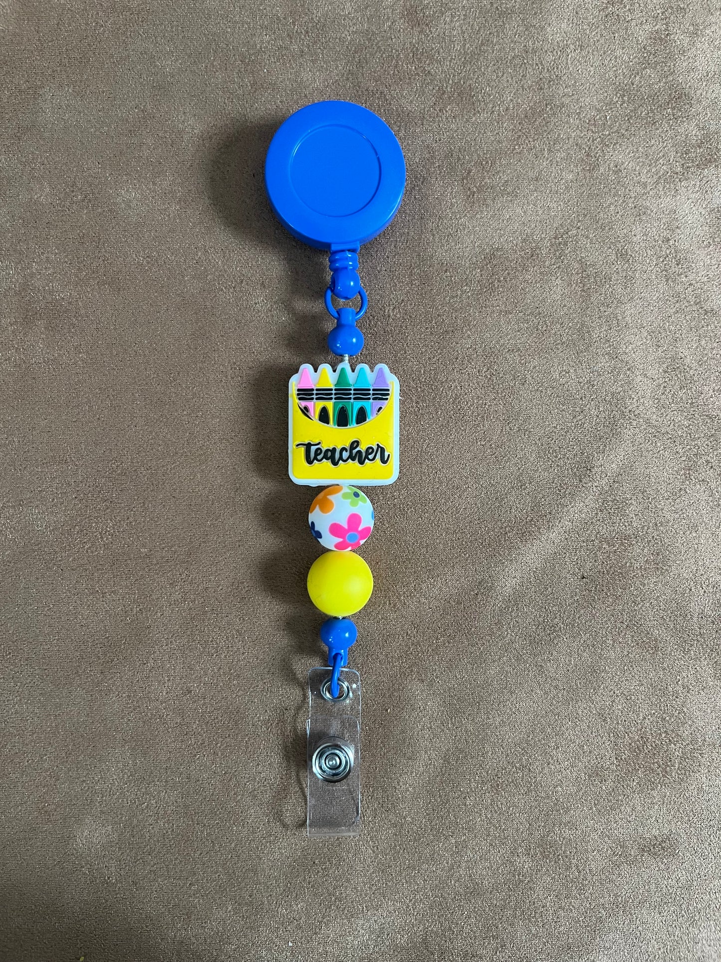 Blue Teacher Crayon Box Badge Reel