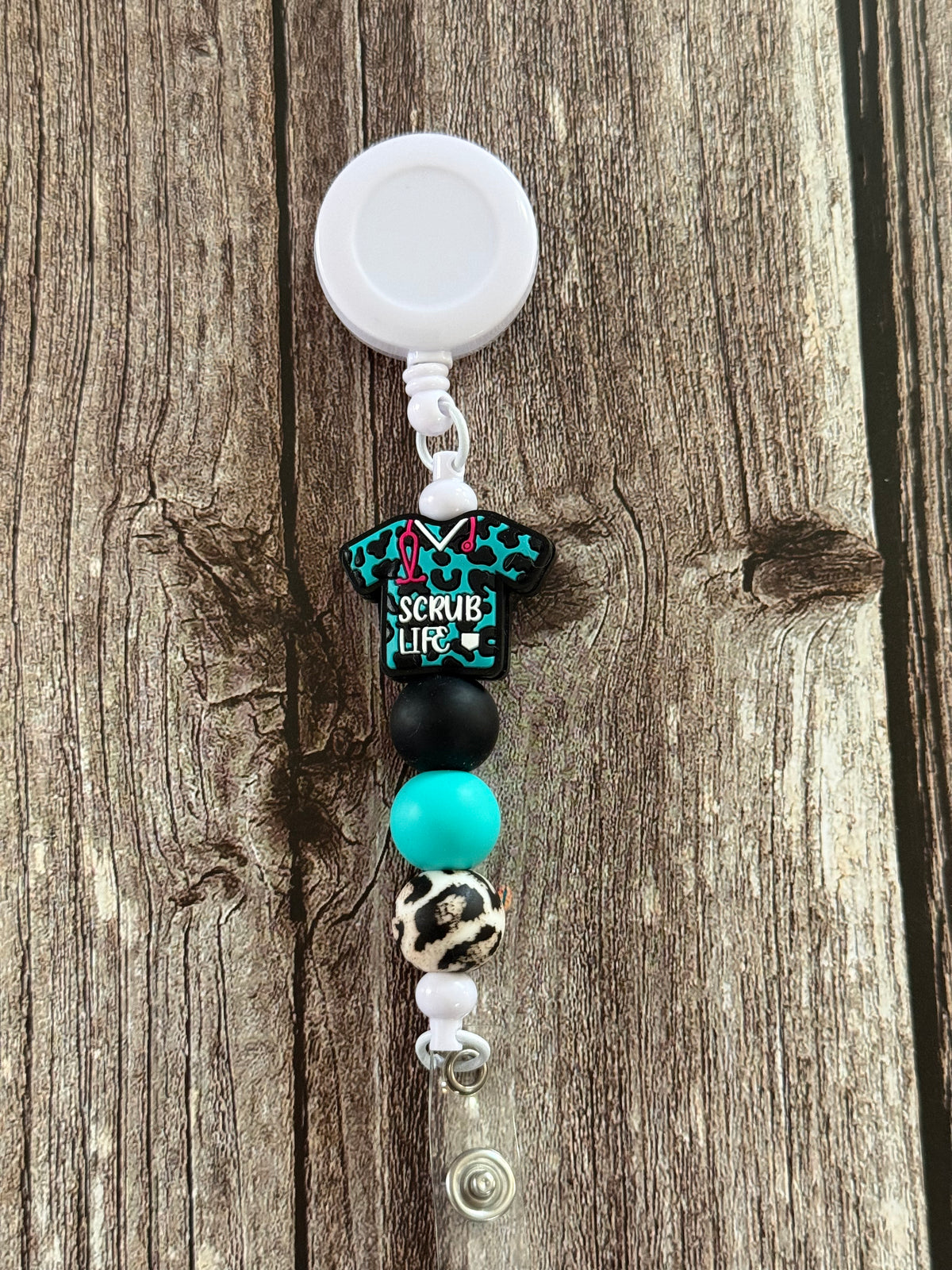 Turquoise and Leopard Scrub Life Badge Reel