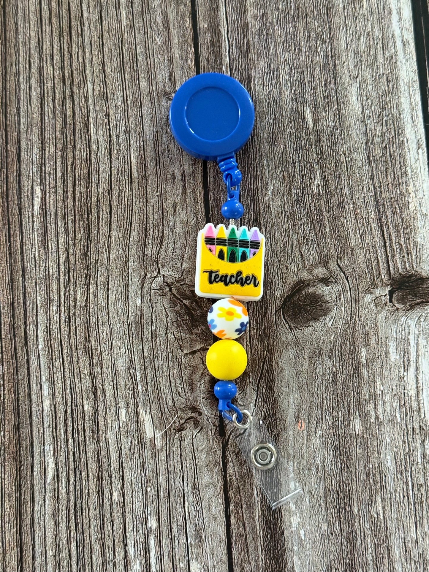 Blue and Yellow Teacher Badge Reel