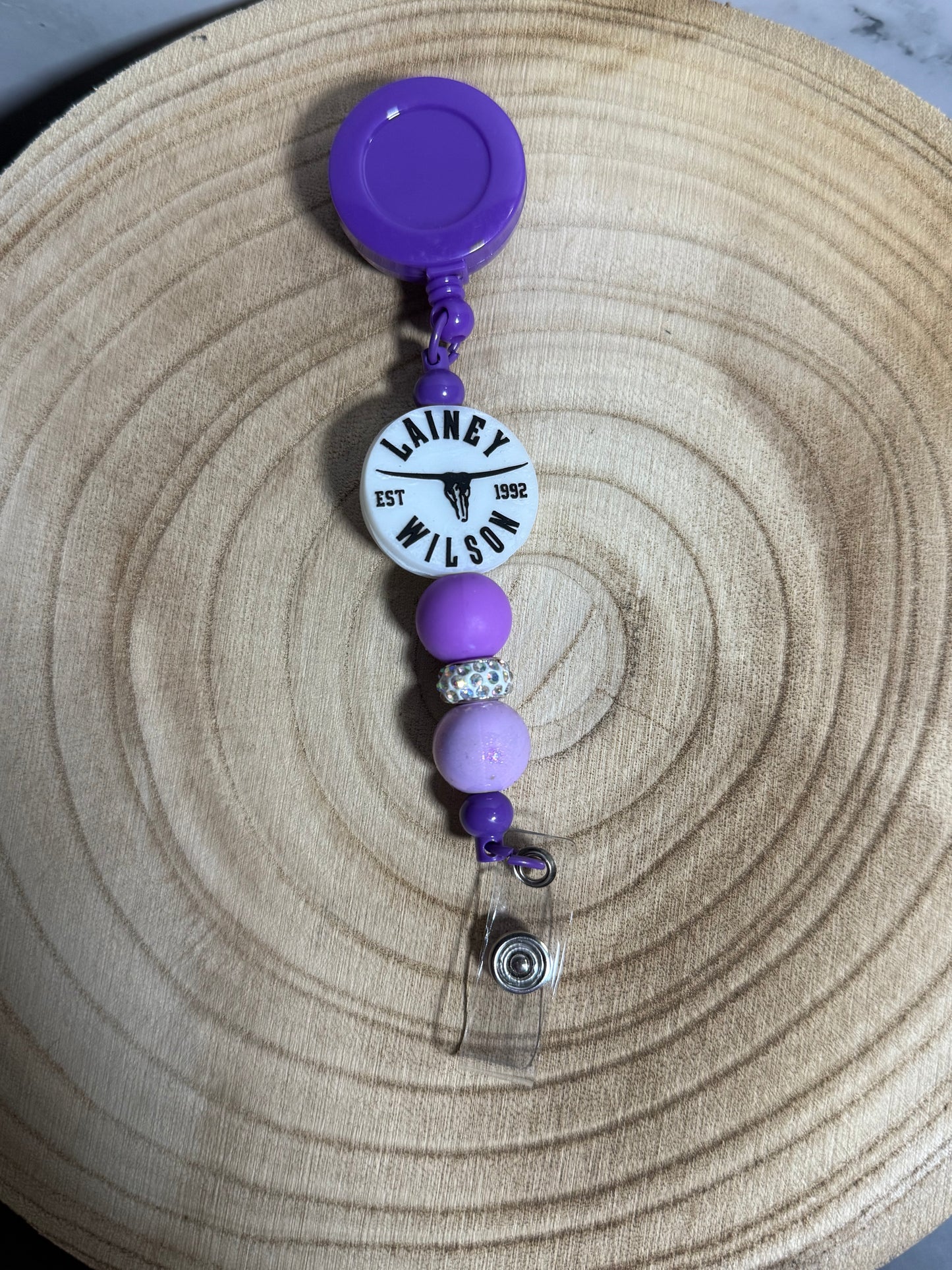 Purple Lainey Wilson Badge Reel