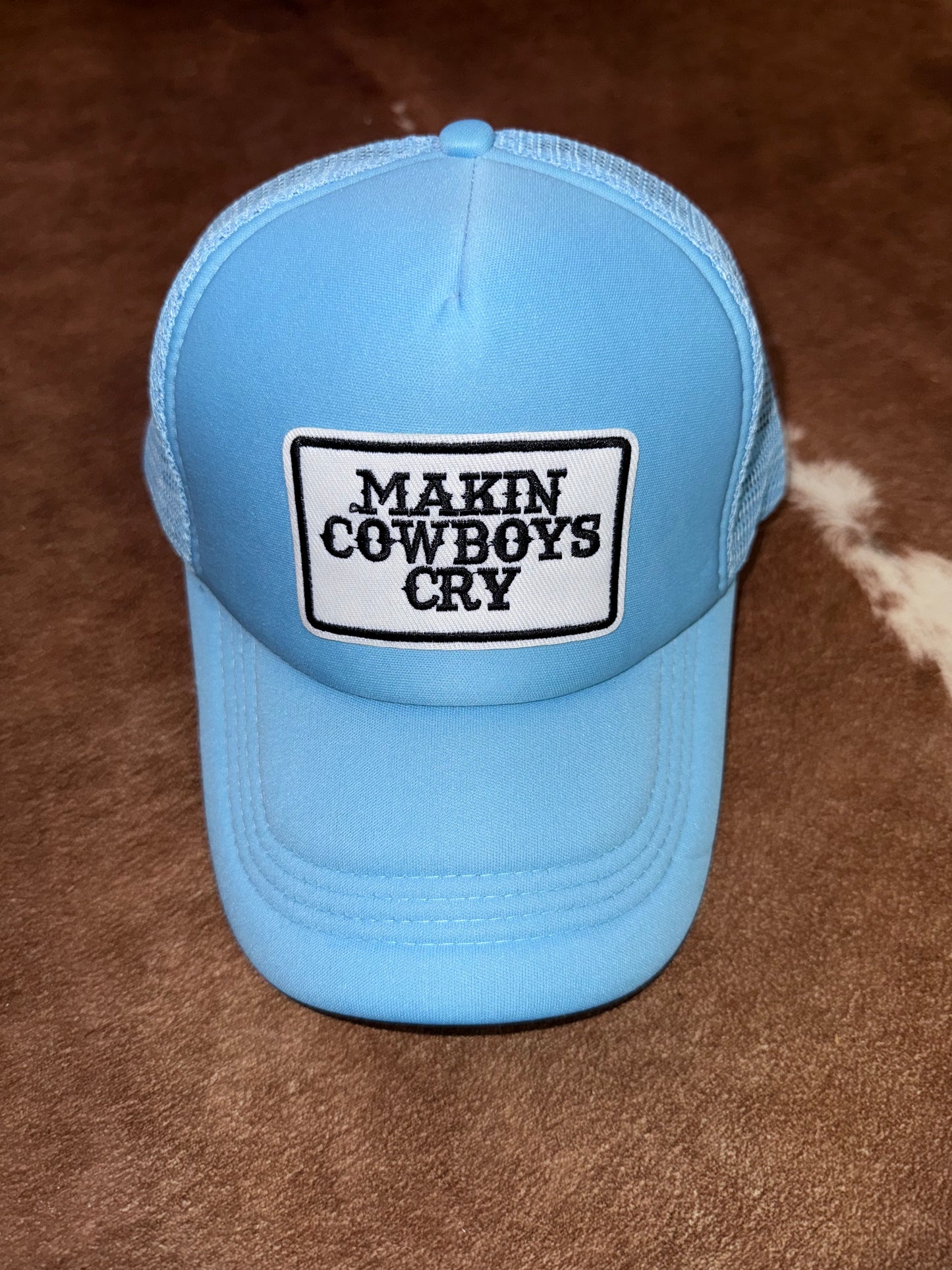 Makin’ Cowboys Cry Trucker Cap