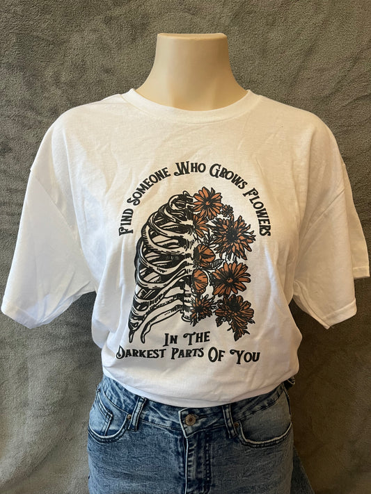 Find Someone Who Grows Flowers in the Darkest Parts of You Graphic T-shirt