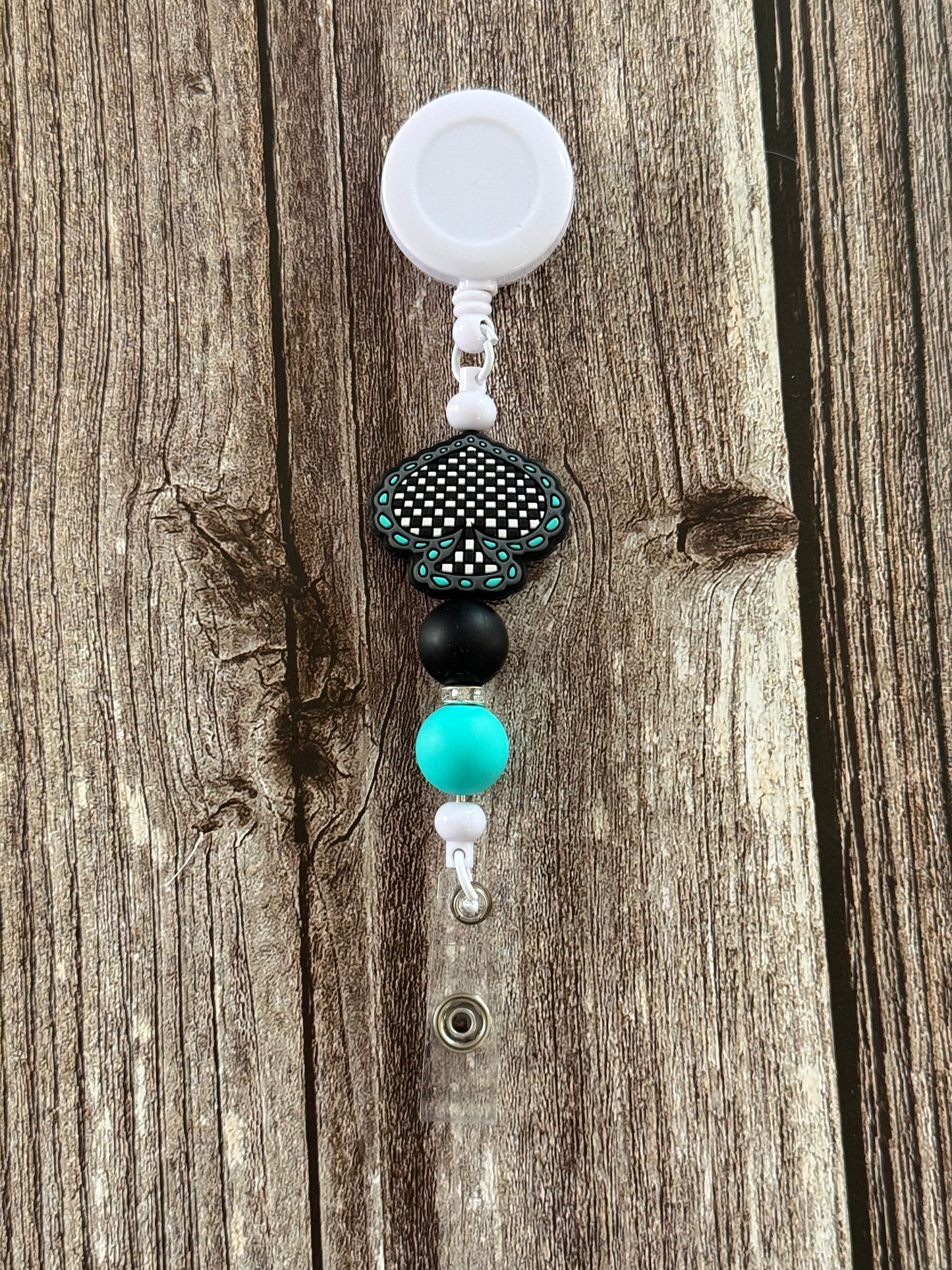 Checkered Spade Badge Reel