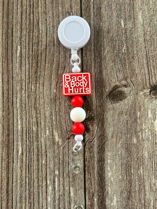 Back and Body Hurts Badge Reel