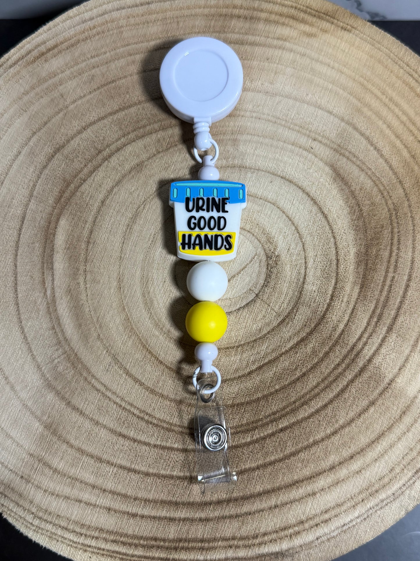 Urine Good Hands Badge Reel