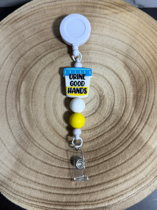 Urine Good Hands Badge Reel